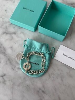 Tiffany & Co. Silver Heart Toggle Charm Bracelet with Blue-Green Pouch